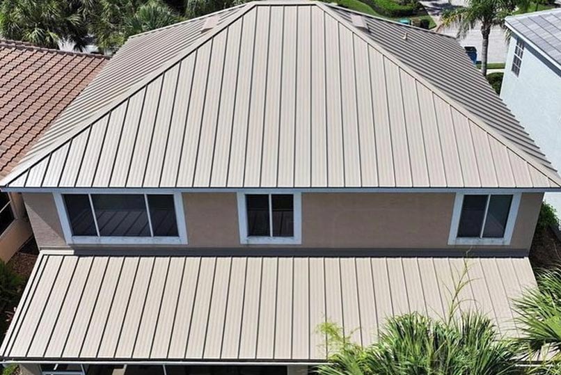 The top view of a two-story house with a metal roof and large windows